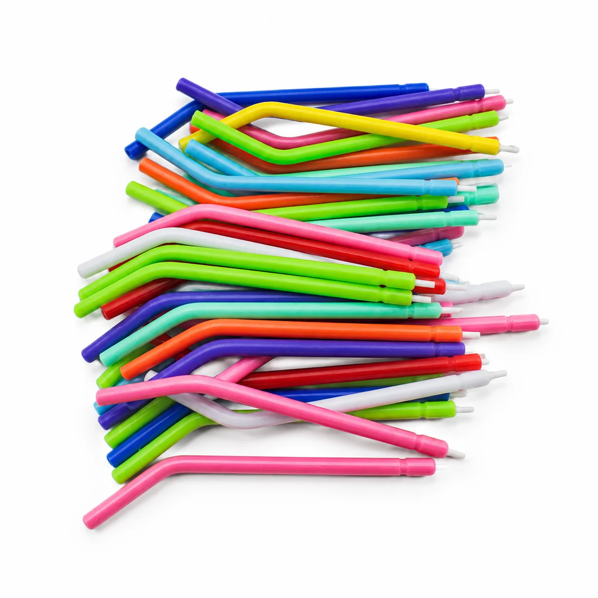 A bundle of colourful disposable dental air/water syringe tips, on a white background